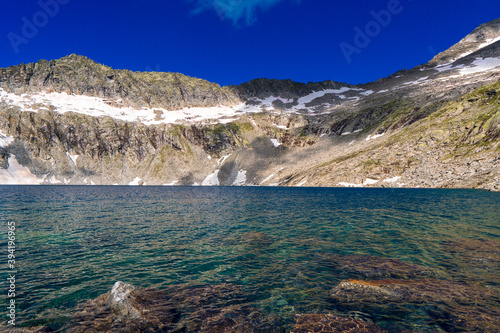 Lake Eissee and mountain panorama in Hohe Tauern Alps, Austria photo