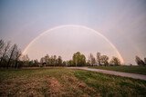 beautiful rainbow above countryside roads
