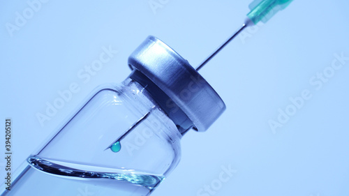 Medical scientist mix vaccine in the vile. Lab developing research of vaccine against Coronavirus, COVID-19, SARS-CoV-2, 2019-ncov. Pre-clinical evaluation and clinical phase trials development test