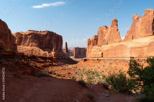 Arches National park at sunset with various rock formations.
