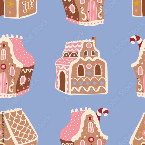Cute Christmas vector pattern with gingerbread houses on pastel blue background. Winter holidays, sweet, for kids, festive, treats, cookies, new year, Christmas market