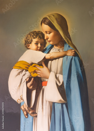 REGGIO EMILIA, ITALY - APRIL 12, 2018: The painting of Madonna with the Child in church Chiesa dei Cappuchini by Padre Angelico da Villarotta (1939).