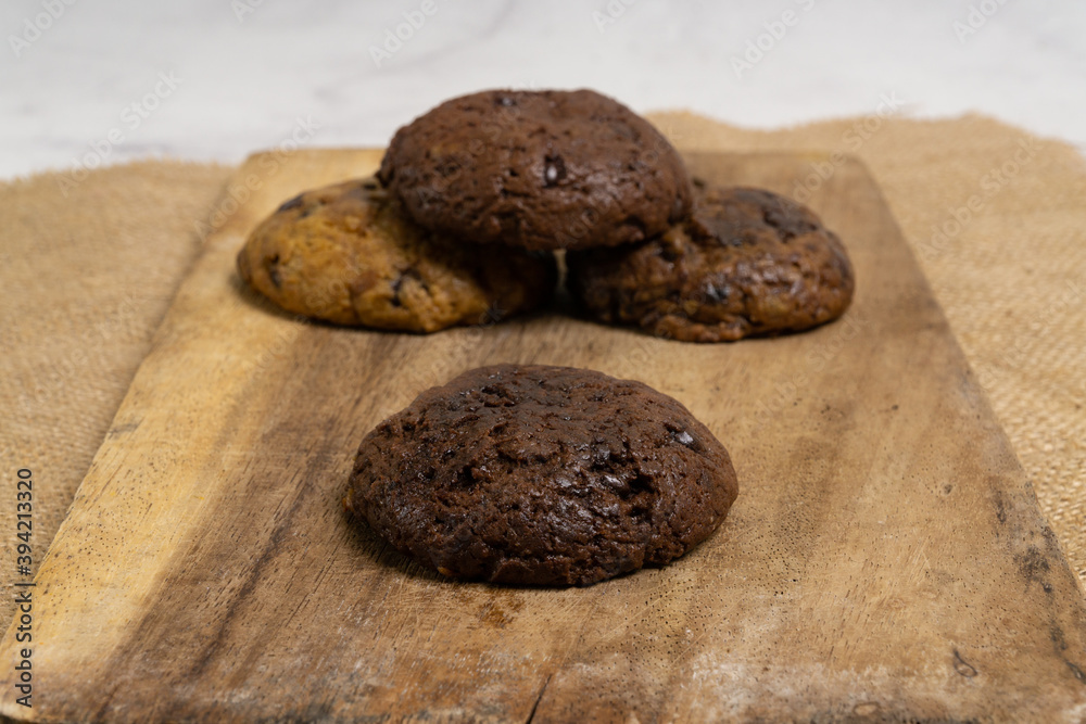 Fudgy Soft Baked Cookies in RUstic Decoration Background Fudgy Soft Baked Cookies in RUstic Decoration Background