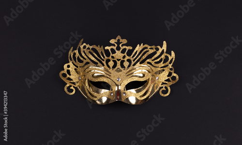 Fotografia golden masquerade mask isolated on black background