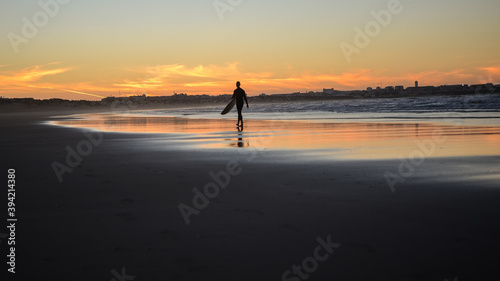 Surfer and sunset © Sergo