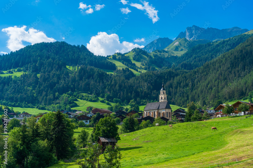 Mountain valley village landscape in Venediger alps . Mountain green valley village view austria near matrei in osttirol