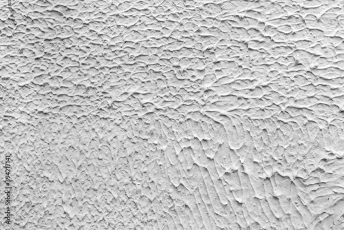 Texture of white plaster. Interior of a modern loft. Abstract rough background. The facade of an old house.