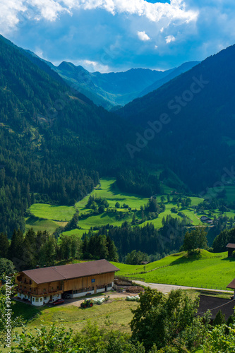 Mountain valley village landscape in Venediger alps . Mountain green valley village view austria near matrei in osttirol