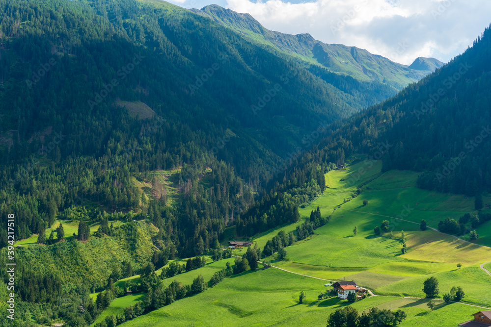 Mountain valley village landscape in Venediger alps . Mountain green valley village view austria near matrei in osttirol