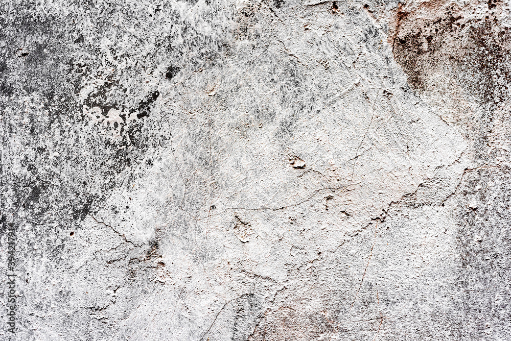Naklejka premium Texture of a concrete wall with cracks and scratches which can be used as a background