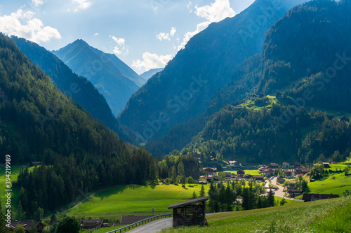 Mountain valley village landscape in Venediger alps . Mountain green valley village view austria near matrei in osttirol