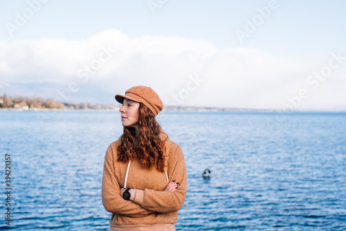 a red-haired girl in a red hat and a red hoodie