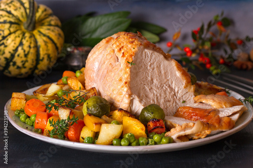 Roasted sliced turkey breast. Thanksgiving dinner table