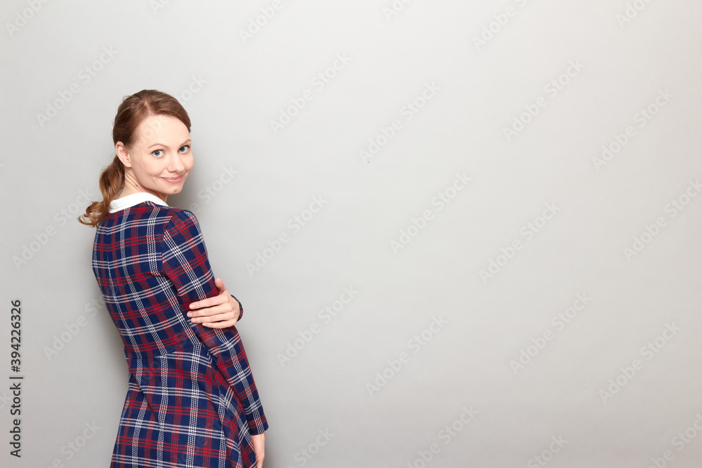 Portrait of happy girl turning around and smiling joyfully Portrait of happy girl turning around and smiling joyfully