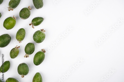 Feijoa pattern border on white background. Vitamin, immunity, recipe concept. Top view, copy space, flat lay