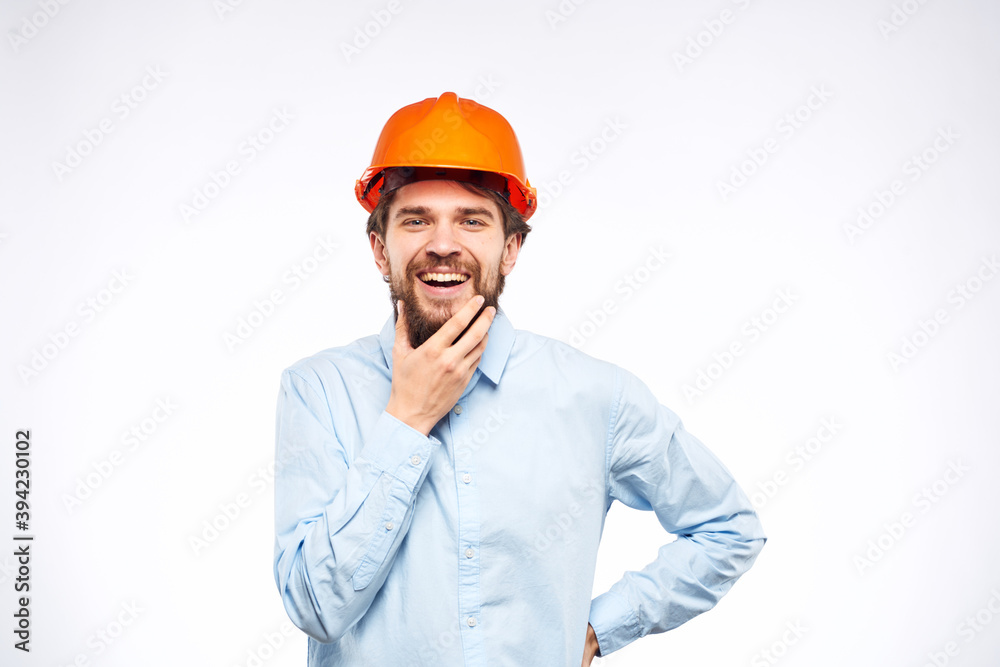 Cheerful man in working industry uniform Professional job manager