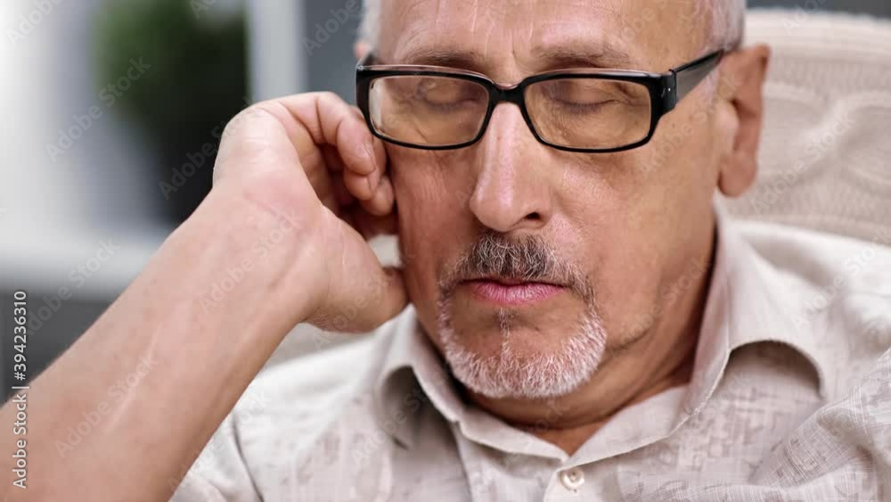 Extreme close up sad mature man wrinkled face feeling solitude. Shot on RED Raven 4k Cinema Camera Extreme close up sad mature man wrinkled face feeling solitude. Shot on RED Raven 4k Cinema Camera