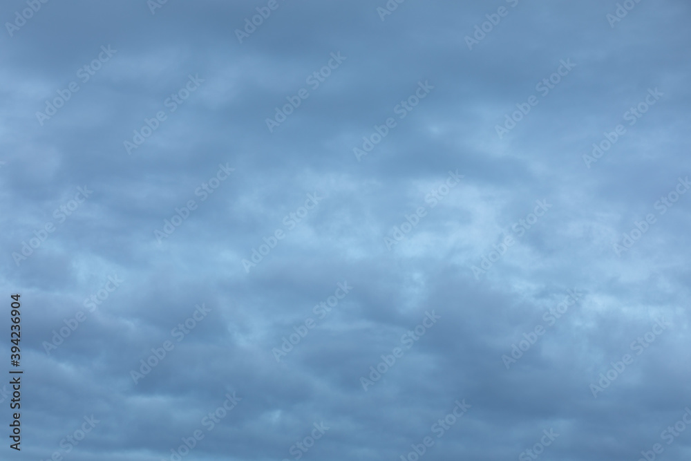 Fototapeta premium Background of gray clouds at sky at dawn