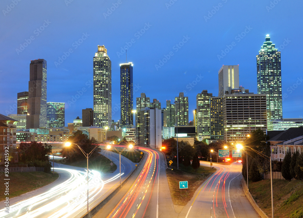 View To Atlanta Skyline From Freedom Parkway At Dusk On A Sunny Autumn Day With A Clear Blue Sky And A Few Clouds View To Atlanta Skyline From Freedom Parkway At Dusk On A Sunny Autumn Day With A Clear Blue Sky And A Few Clouds