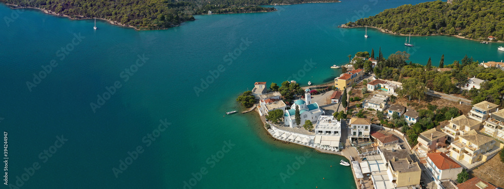Aerial drone ultra wide panoramic photo of picturesque seaside village and bay of Porto Heli a safe anchorage for yachts and sailboats, Argolida, Peloponnese, Greece