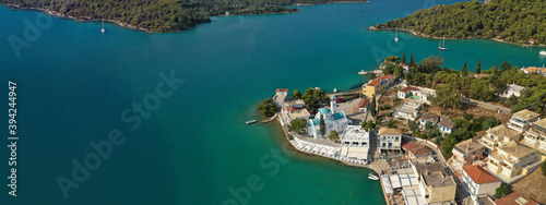 Fototapeta Naklejka Na Ścianę i Meble -  Aerial drone ultra wide panoramic photo of picturesque seaside village and bay of Porto Heli a safe anchorage for yachts and sailboats, Argolida, Peloponnese, Greece