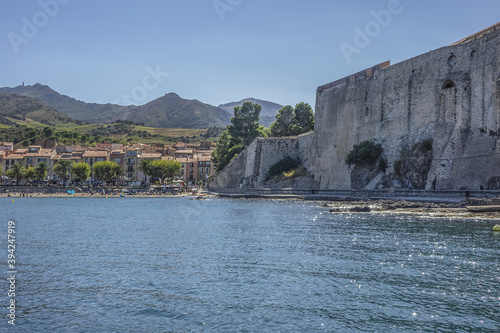 Beautiful view of Mediterranean Sea, Collioure village, bay of Ansa de la Baleta. Collioure - popular summer tourist destination. Collioure, Roussillon, Vermilion coast, Pyrenees Orientales, France. photo