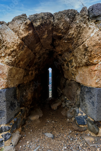 The loopholes in the wall of the 12th century Crusader fortress directed towards the Jordan Valley. Jordan Star National Park. Israel photo