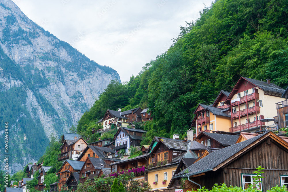Scenic picture-postcard view of famous Hallstatt mountain village in the Austrian Alps at beautiful light in summer, Salzkammergut region, Hallstatt, Austria Scenic picture-postcard view of famous Hallstatt mountain village in the Austrian Alps at beautiful light in summer, Salzkammergut region, Hallstatt, Austria