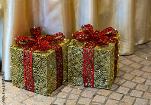 Merry Christmas gift box with bows for greeting card. Decoration and copy space for your text. Happy New Year 2021 winter merry handmade holiday present composition. Boxes of Christmas gifts