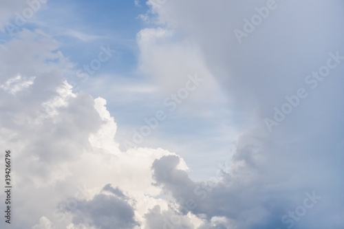 Light blue sky with natural white fluffy clouds © kvitkanastroyu