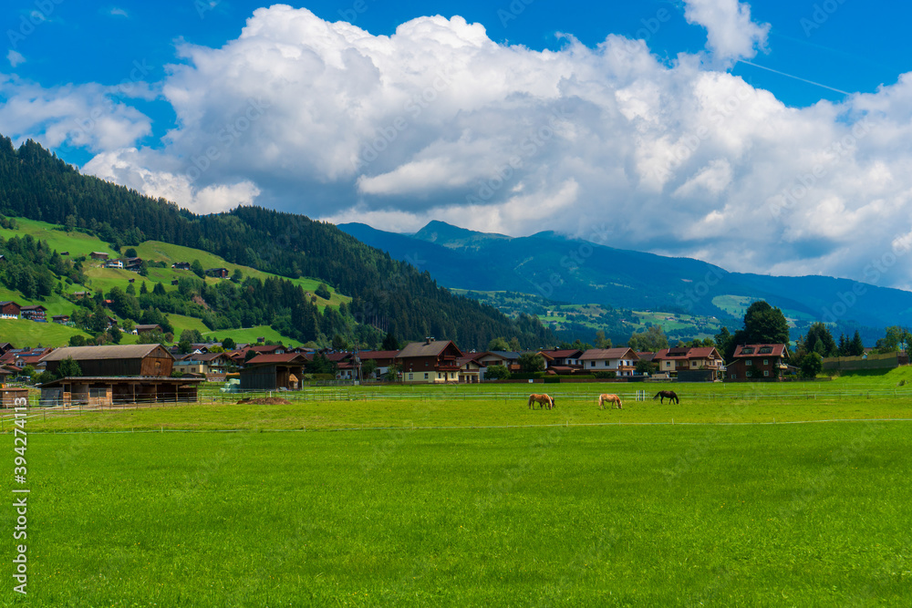 Green valley village landscape. Mountain green valley village view. Mountain valley village landscape. Austria alps europe