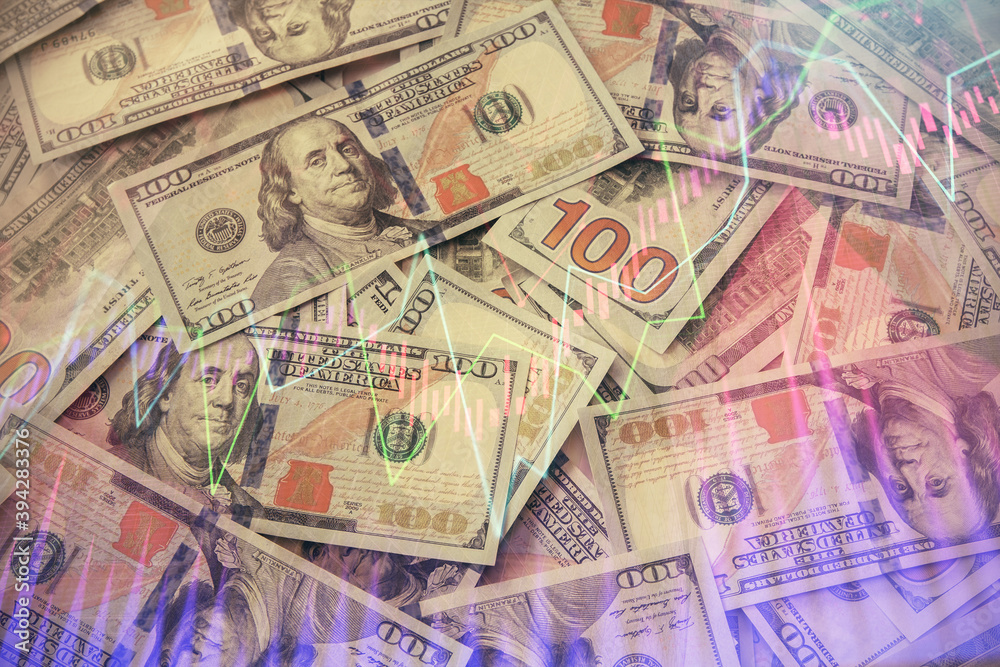 Multi exposure of forex chart drawing over us dollars bill background. Concept of financial success markets. Multi exposure of forex chart drawing over us dollars bill background. Concept of financial success markets.