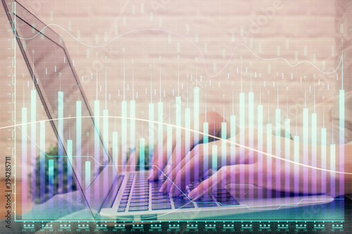Multi exposure of woman hands typing on computer and forex chart hologram drawing. Stock market analysis concept. © peshkova