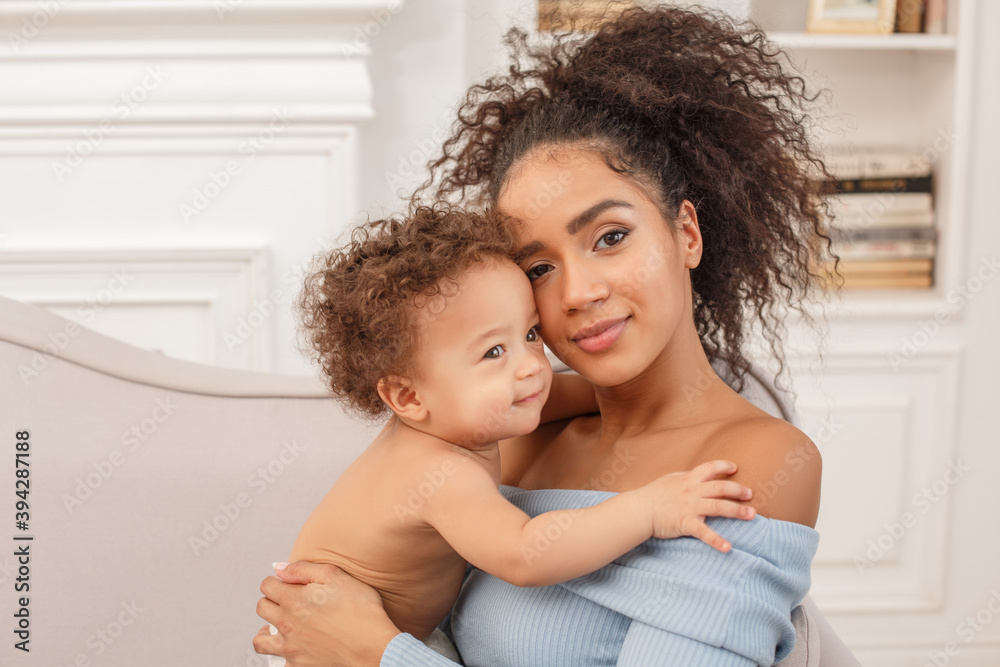Love of a mother and baby. Son and mom. Family in the house. Lifestyle Love of a mother and baby. Son and mom. Family in the house. Lifestyle