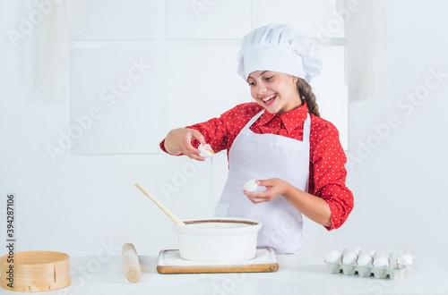 girl baking something for supper, cook