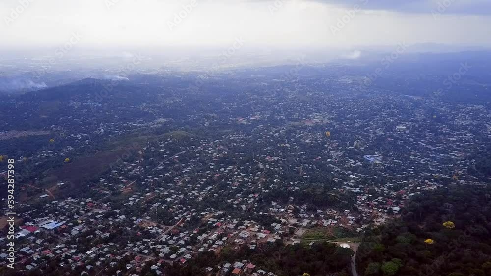 Aerial View of Loma Coba Slum Neighborhood, Republic of Panama, Green Rainforest on Hills and Mist Over Skyline, High Rise Drone Shot Aerial View of Loma Coba Slum Neighborhood, Republic of Panama, Green Rainforest on Hills and Mist Over Skyline, High Rise Drone Shot