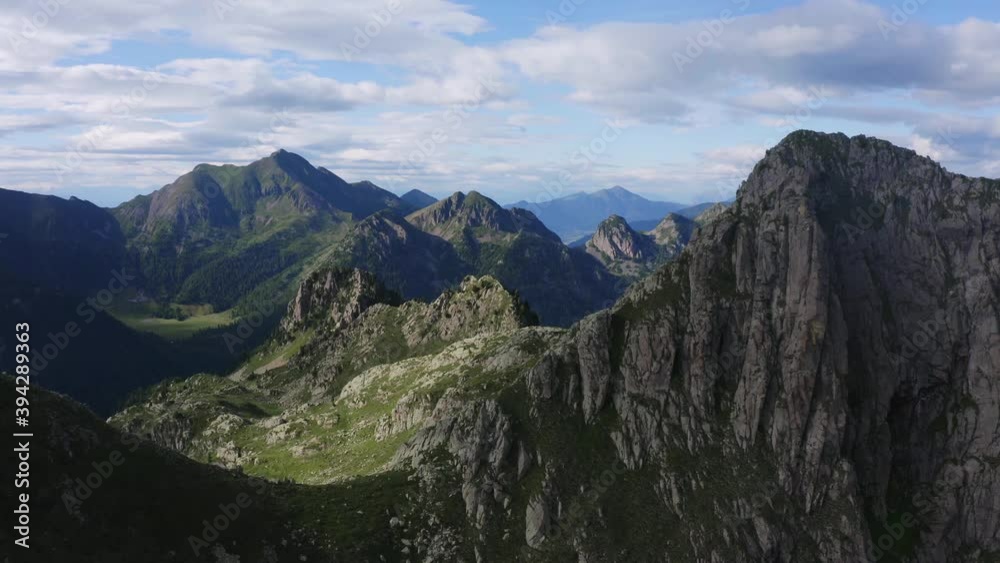 Drone shot from Lagorai mountain ridge in Italy, flying between peaks looking at the amazing scenere all around Drone shot from Lagorai mountain ridge in Italy, flying between peaks looking at the amazing scenere all around