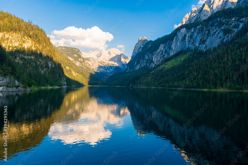 Beautiful summer scene of vorderer gosausee lake. Colorful evening view of Salzkammergut berge Alps on the Austrian , Europe. Beauty of nature concept background.