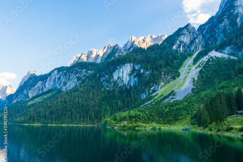 Fototapeta Naklejka Na Ścianę i Meble -  Beautiful summer scene of vorderer gosausee lake. Colorful evening view of Salzkammergut berge Alps on the Austrian , Europe. Beauty of nature concept background.