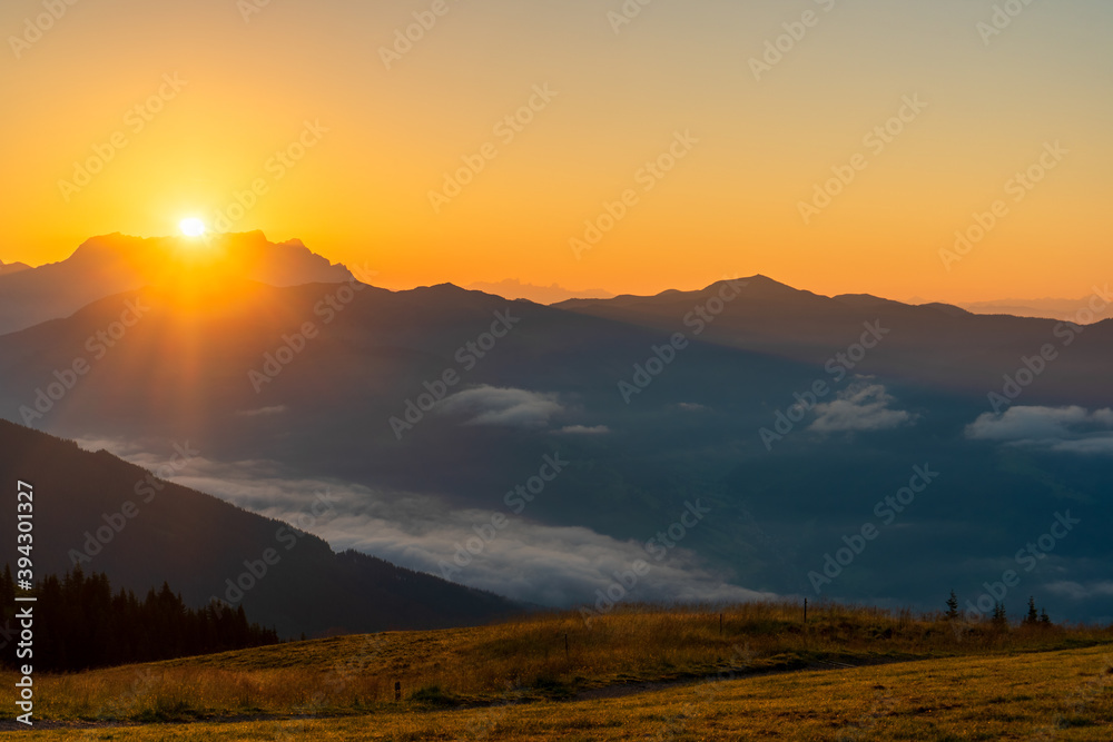 sinrise view from Schmitten mountain in Austria - near Zell am See - alps mountain in europe