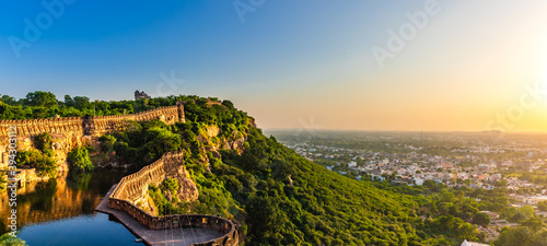 View during sunset from Chittor or Chittorgarh Fort with city in backdrop. It is one of the largest forts in India &  listed in the UNESCO World Heritage Sites list as Hill Forts of Rajasthan. photo