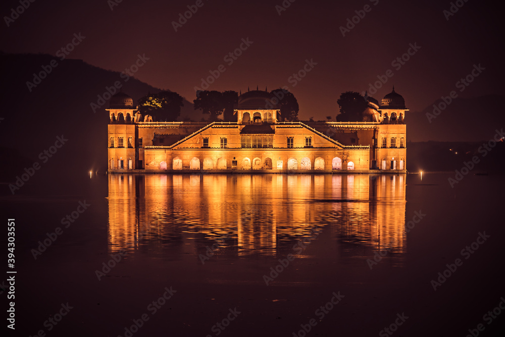 Illuminated night view of Jal Mahal 'Water Palace' is an architectural showcase of Rajput style in the Man Sagar lake in jaipur city, the capital of Rajasthan, India.