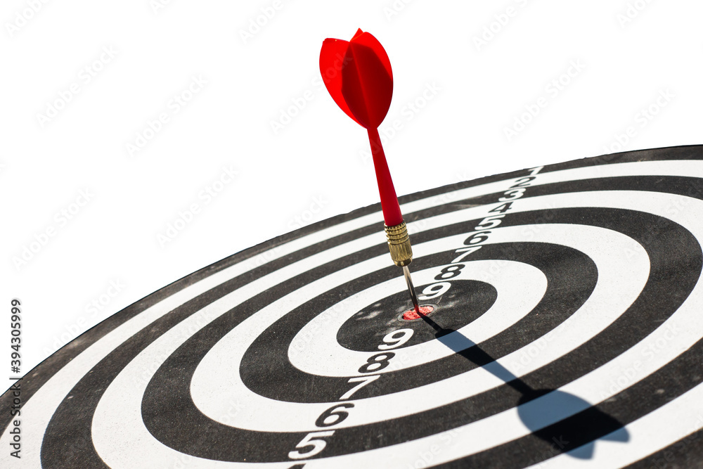Close up shot red dart arrow on center of dartboard, Isolated on white background with clipping path Close up shot red dart arrow on center of dartboard, Isolated on white background with clipping path