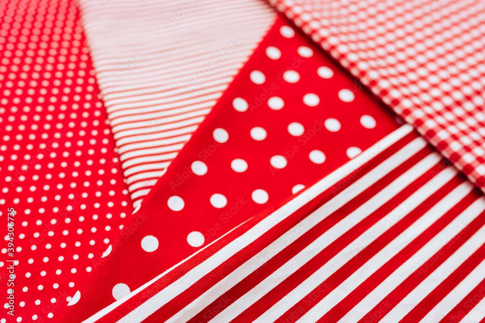 Background from a natural fabric in a red and white colors. Lay flat Background from a natural fabric in a red and white colors. Lay flat
