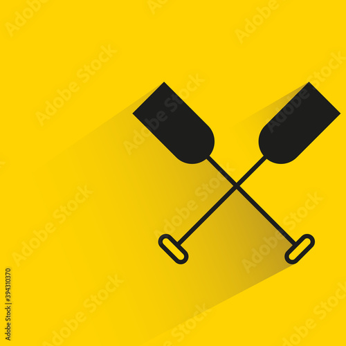 paddle with shadow on yellow background