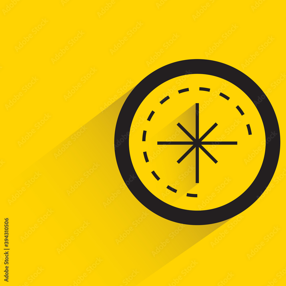 compass with shadow on yellow background compass with shadow on yellow background