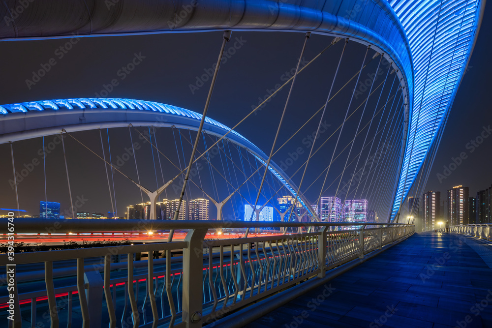 Obraz premium Car light and shadow tracks on bridges and highways at night, Taiyuan, Shanxi Province, China