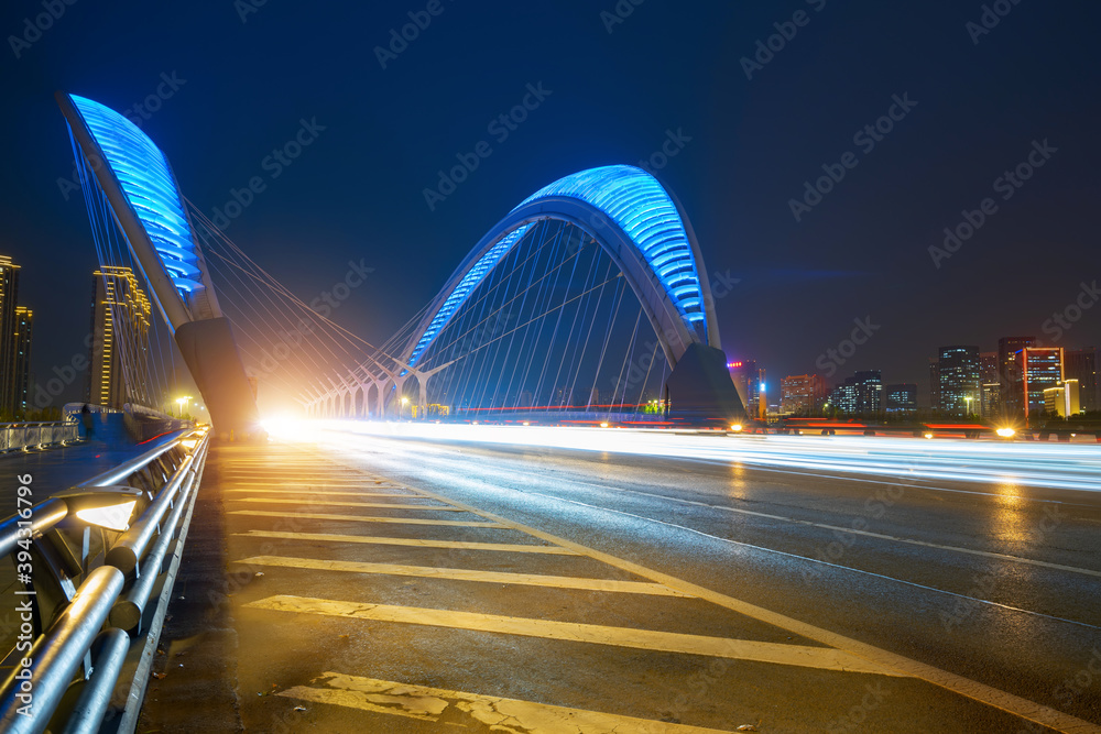Naklejka premium Car light and shadow tracks on bridges and highways at night, Taiyuan, Shanxi Province, China
