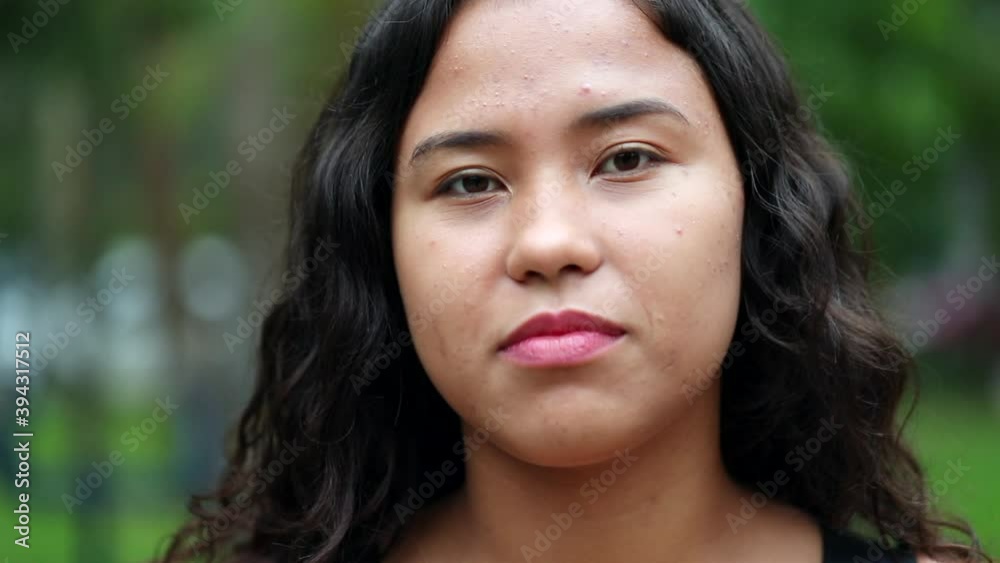 Hispanic girl in 20s portrait face close-up outside Hispanic girl in 20s portrait face close-up outside
