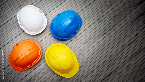 Multicolour Safety Construction Worker Hats. Teamwork of the construction team must have quality. Whether it is engineering, construction workers. Have a helmet to wear at work. For safety at work.